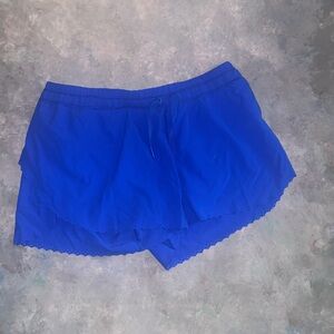 Lululemon Women's Blue Lace Trim Shorts running.